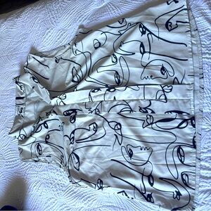 Abstract Face Print Sleeveless Blouse